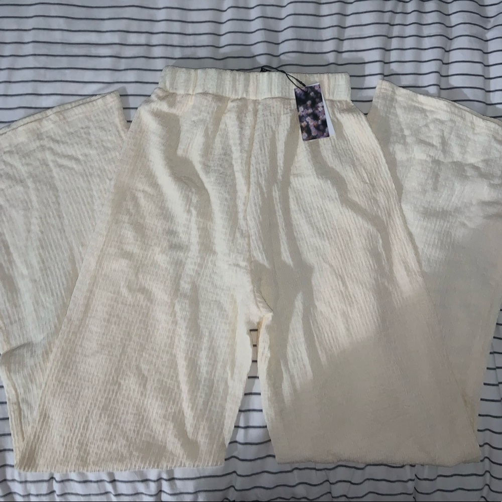 Cream wide leg pants